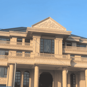 广州黄金麻别墅外墙干挂石材效果示例