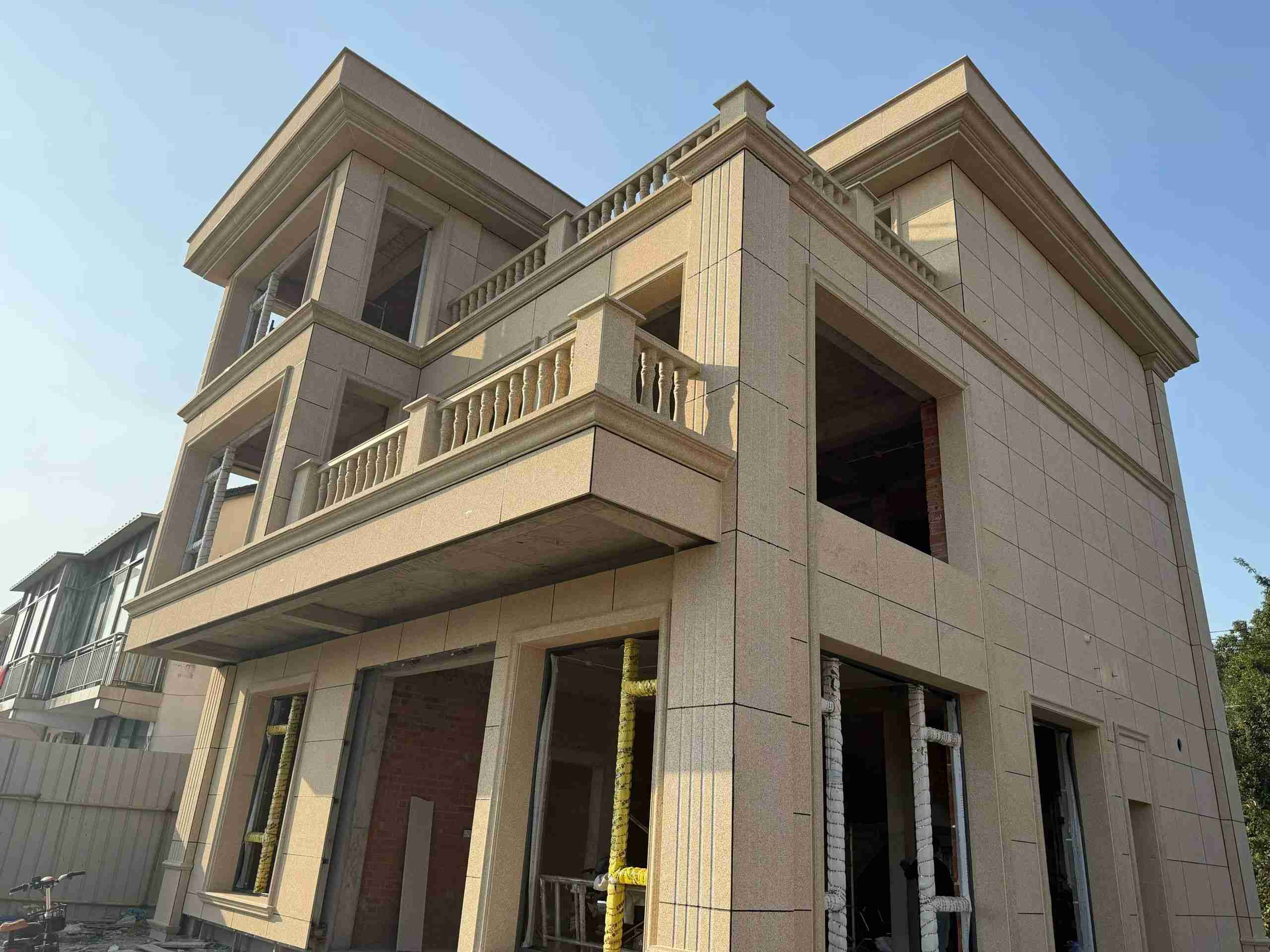 广州 黄金麻花岗岩石材荔枝面外墙干挂效果展示