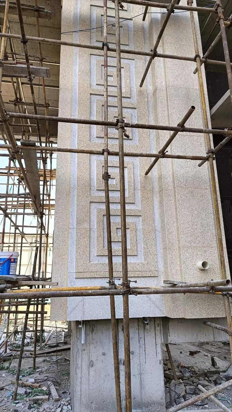 广州 黄金麻花岗岩别墅外墙干挂回纹造型效果